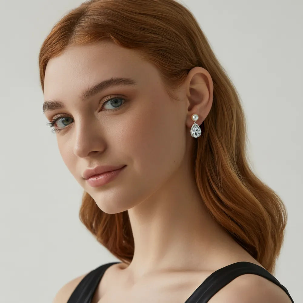 A model showcasing the latest earring trends for 2025 from the GlamBodyCandy new arrivals collection.