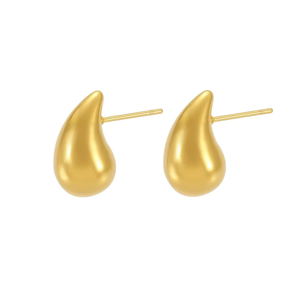 Pair of Aella Teardrop Stud Earrings in a polished 18k gold plate finish.