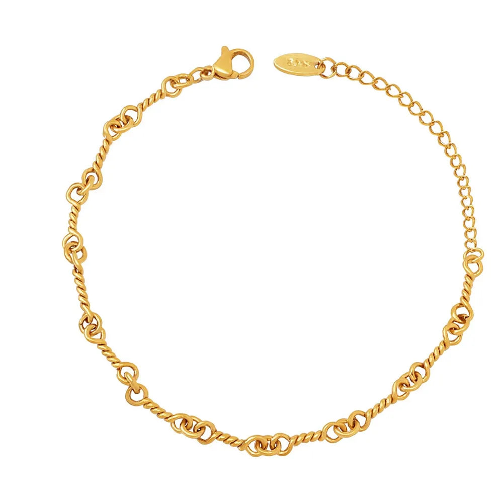 The Alia Interlocking Bracelet in 18k gold plate, shown individually on a white background.