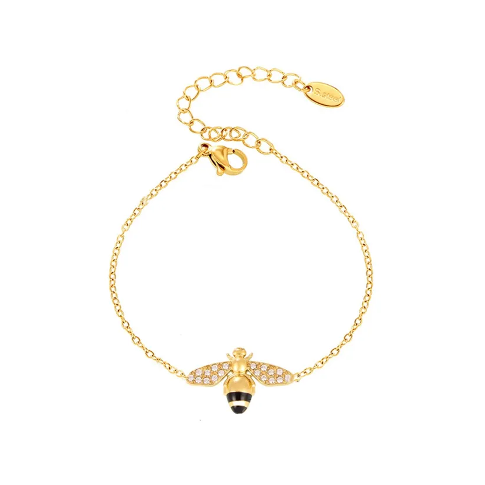 Apia Pavé Bee Charm Bracelet in 18k gold with zirconia and black enamel.
