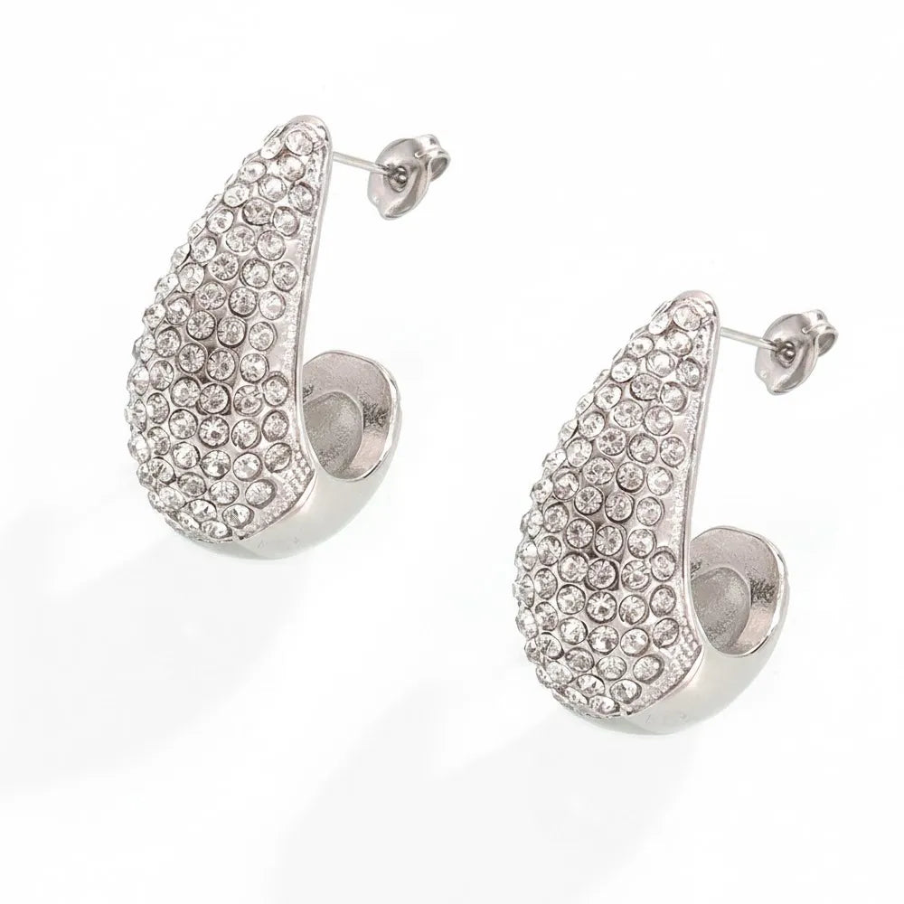 A product shot of the Aura Teardrop Stud Earrings in a polished stainless steel silver finish