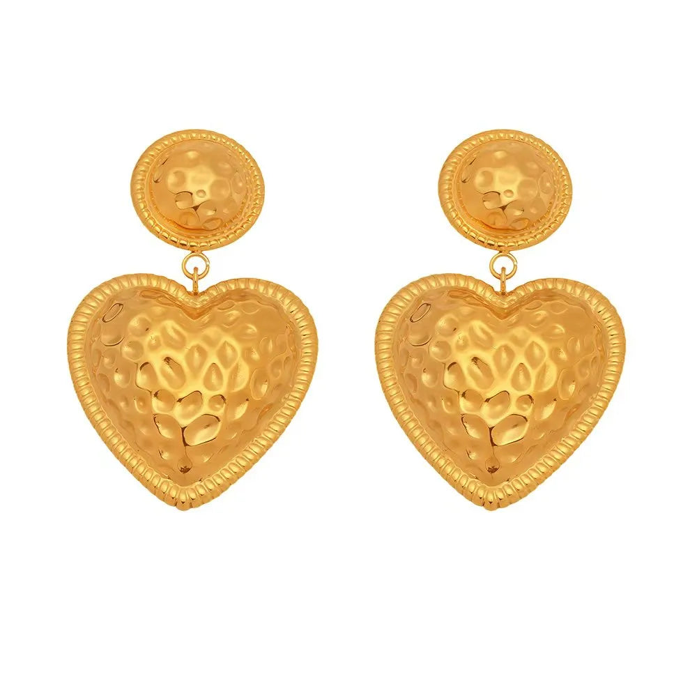18K gold plated 316L stainless steel drop earrings with textured baroque heart charms on a white background