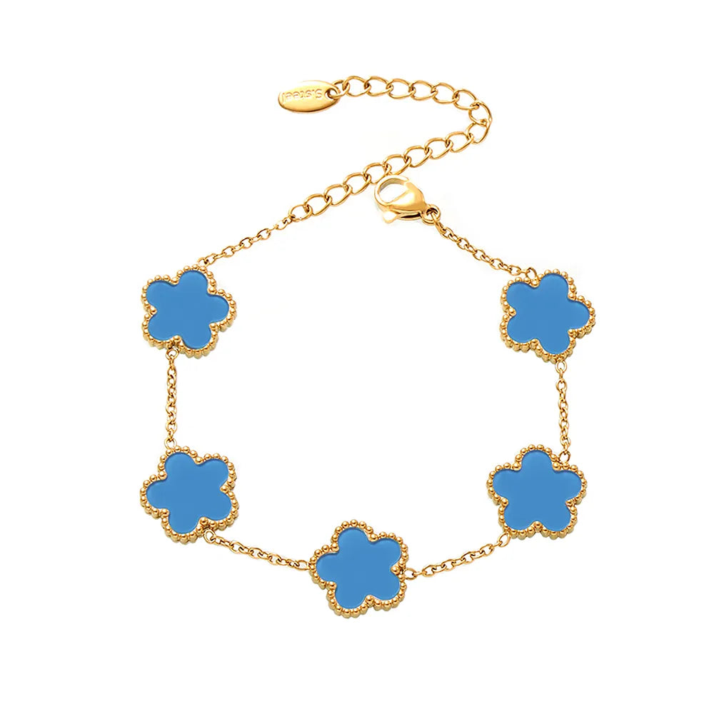 A product shot of the Fleur Bloom Bracelet, highlighting the serene blue agate stone within the 18k gold plated flower design.