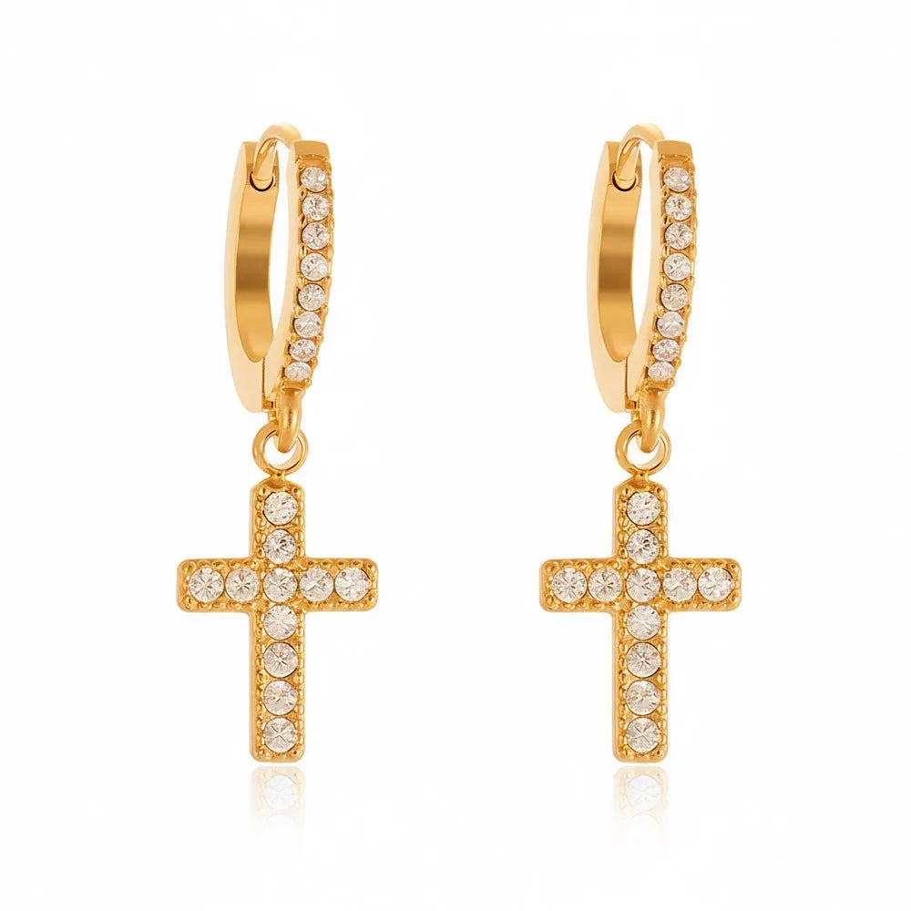 Grace Pavé Cross Huggie Hoops in 18k gold with full zirconia sparkle.