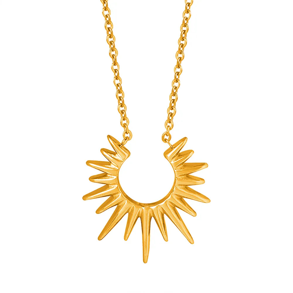 The Helia geometric sunburst pendant necklace in 18k gold plate, shown on a white background.