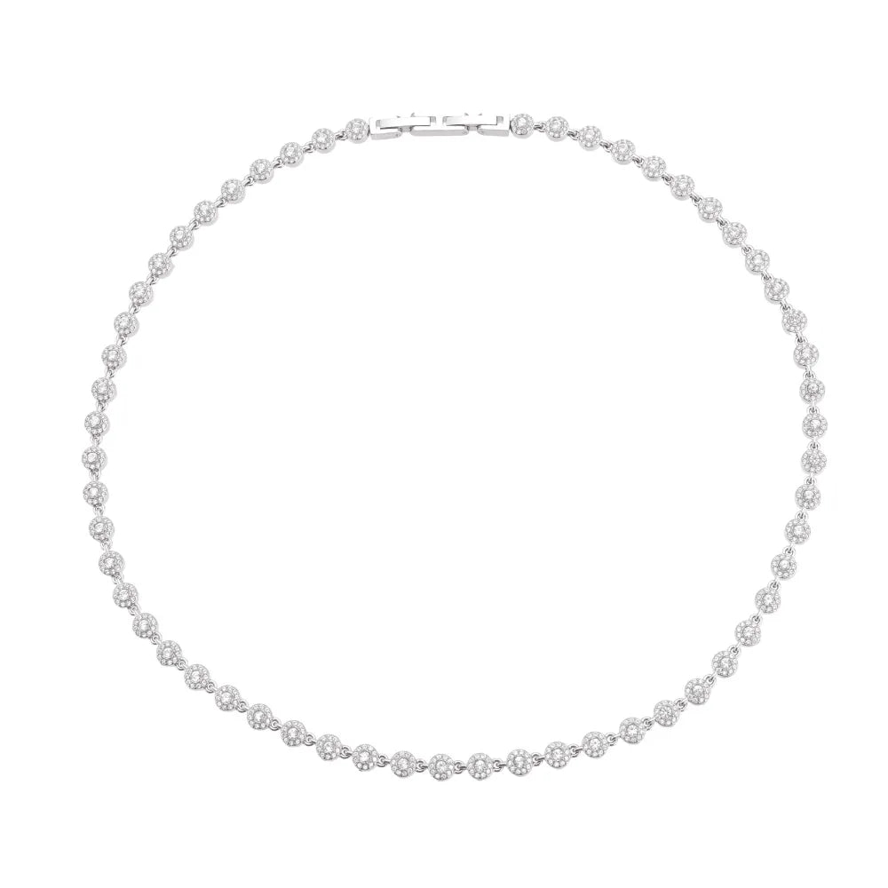 A close-up of the Lucia Zirconia Necklace in stainless steel, highlighting its sparkling round stones.