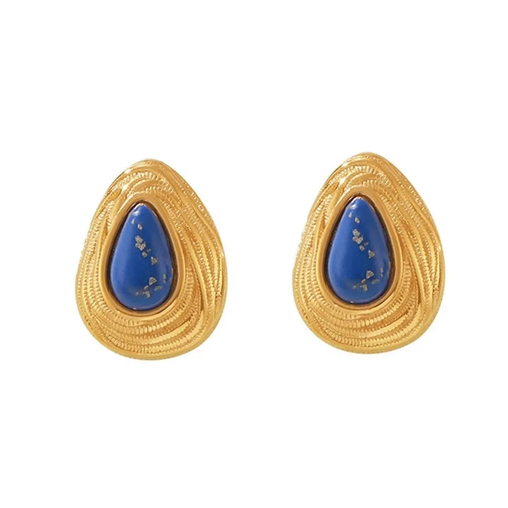 Pair of Lyra Goldstone Stud Earrings in 18k gold with a blue teardrop stone