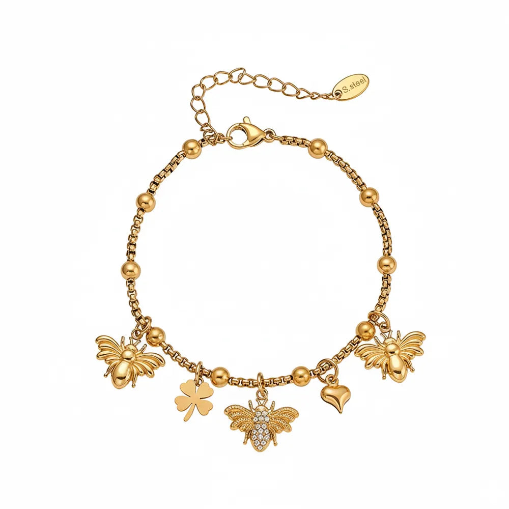 8k gold beaded bracelet with dangling bee, clover, and heart charms.