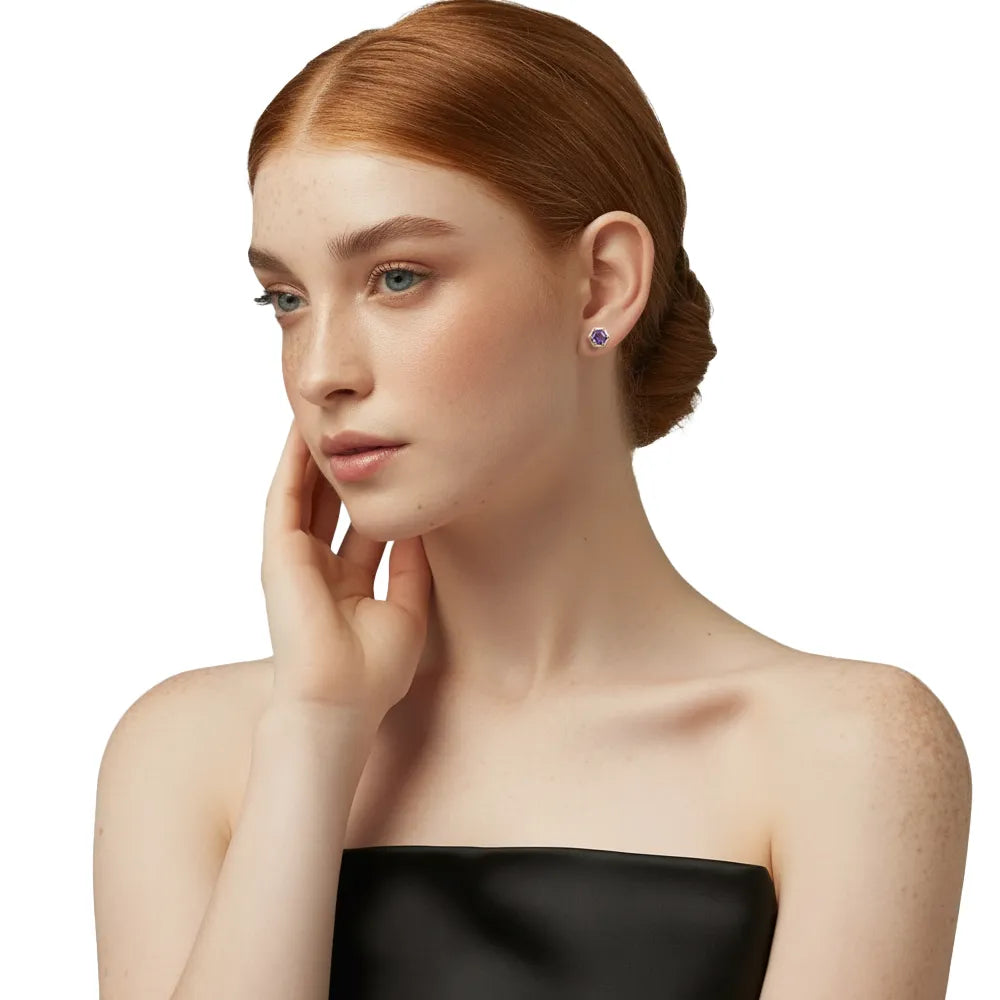 Model showing the side profile of purple amethyst hexagon studs, highlighting the secure 6-prong setting and delicate size