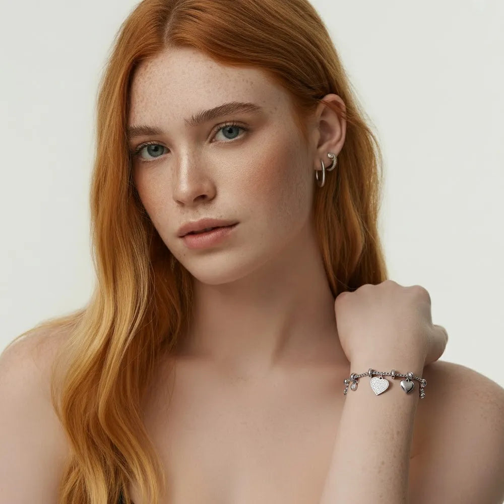A close-up of the stainless steel Lennox Pavé Heart Bracelet on a model&