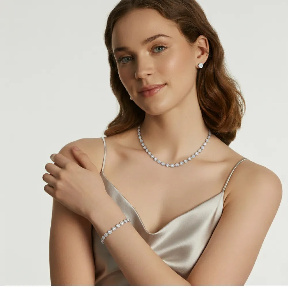 A model wearing the elegant Lucia Zirconia Necklace and Bracelet Set in stainless steel.