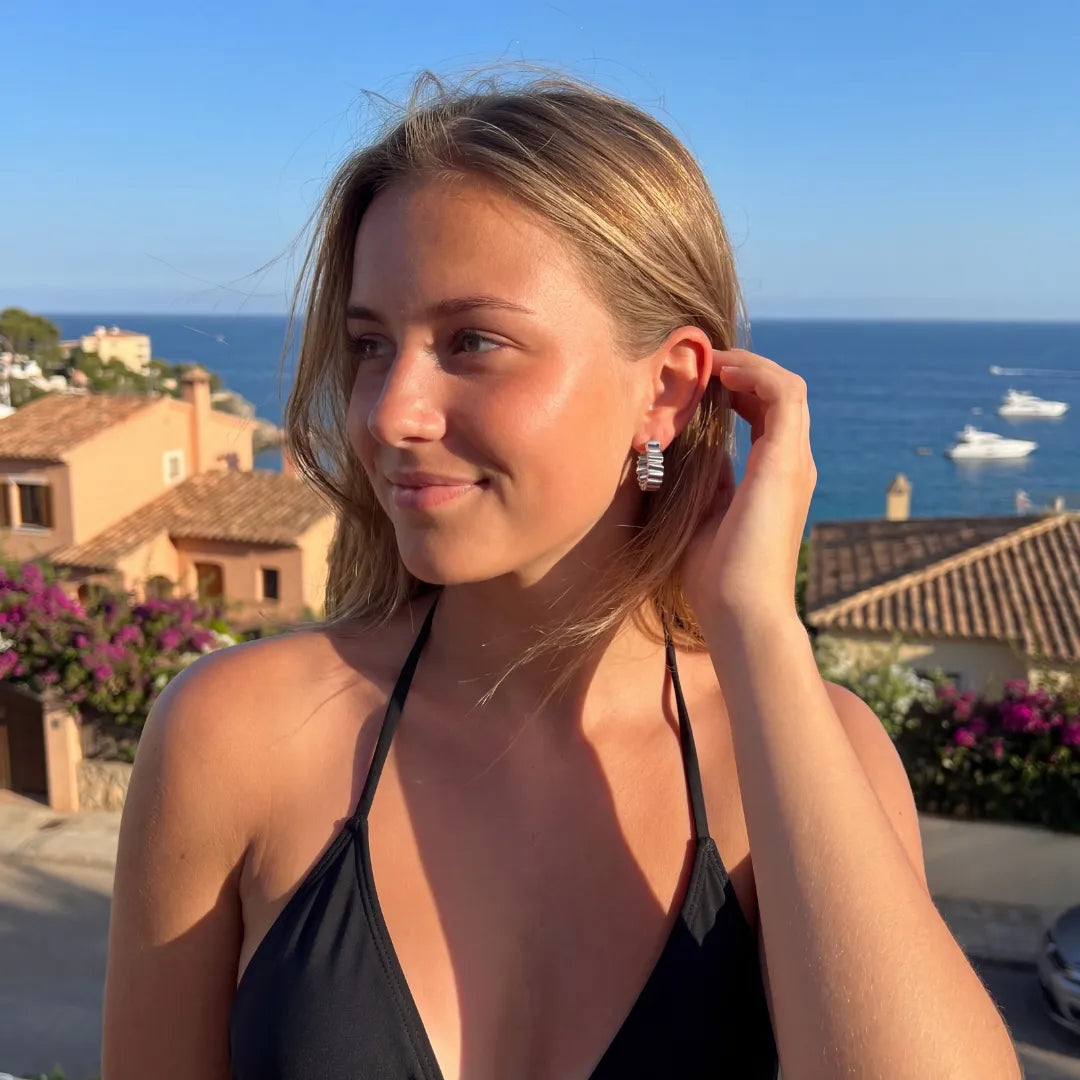 Model wearing the 18k gold plated Rippled Chunky Hoops, highlighting the bold, sculptural texture-04
