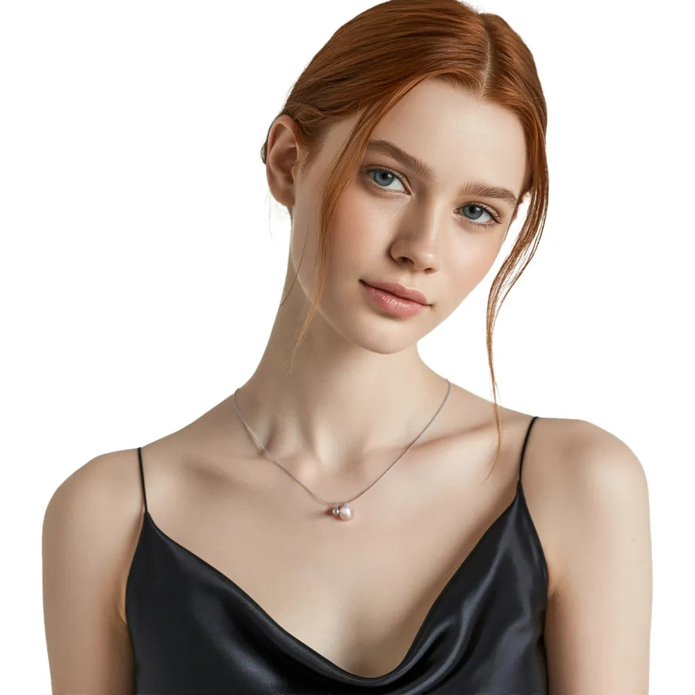 Model wearing the S925 Pearl and Silver Bead Necklace, demonstrating its perfect everyday wear length