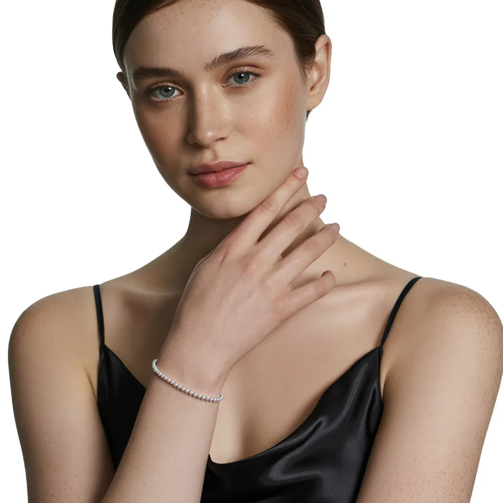 Model wearing the S925 Silver Beaded Bolo Bracelet, highlighting its adjustable fit and delicate appearance.