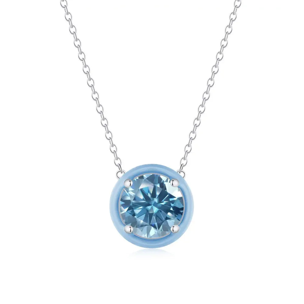 Minimalist silver necklace with a blue round cubic zirconia and matching blue rim.