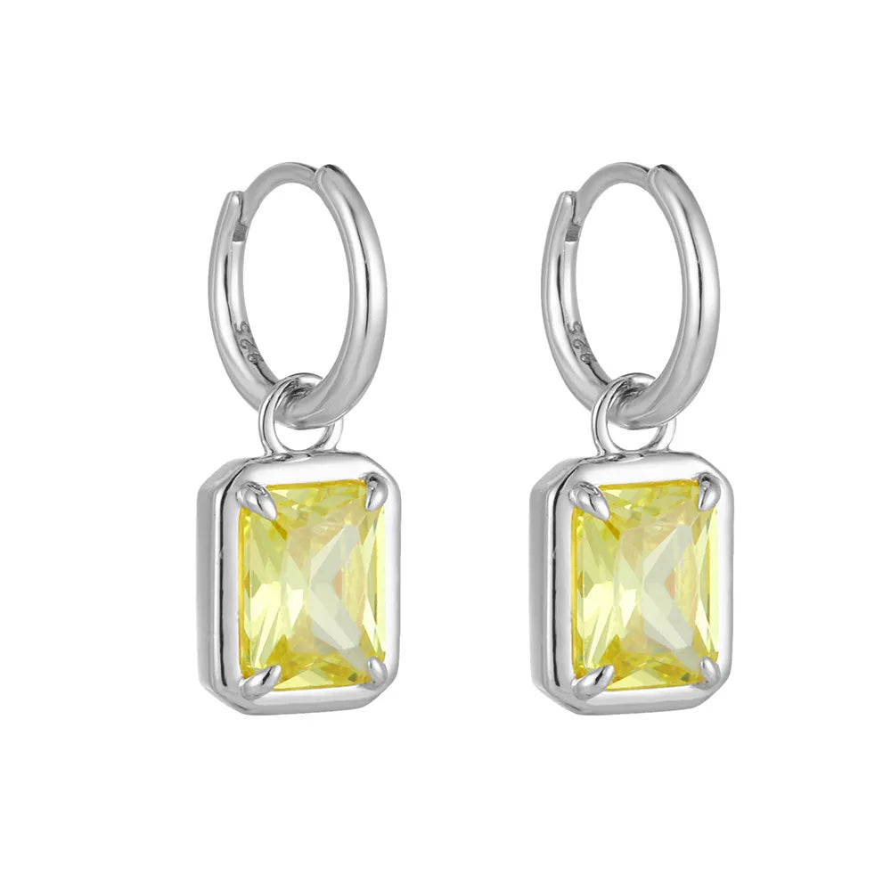 S925 sterling silver huggie earrings with a radiant canary yellow rectangular drop on a white background
