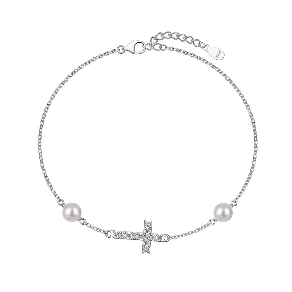S925 sterling silver bracelet with a pave crystal horizontal cross and two pearls