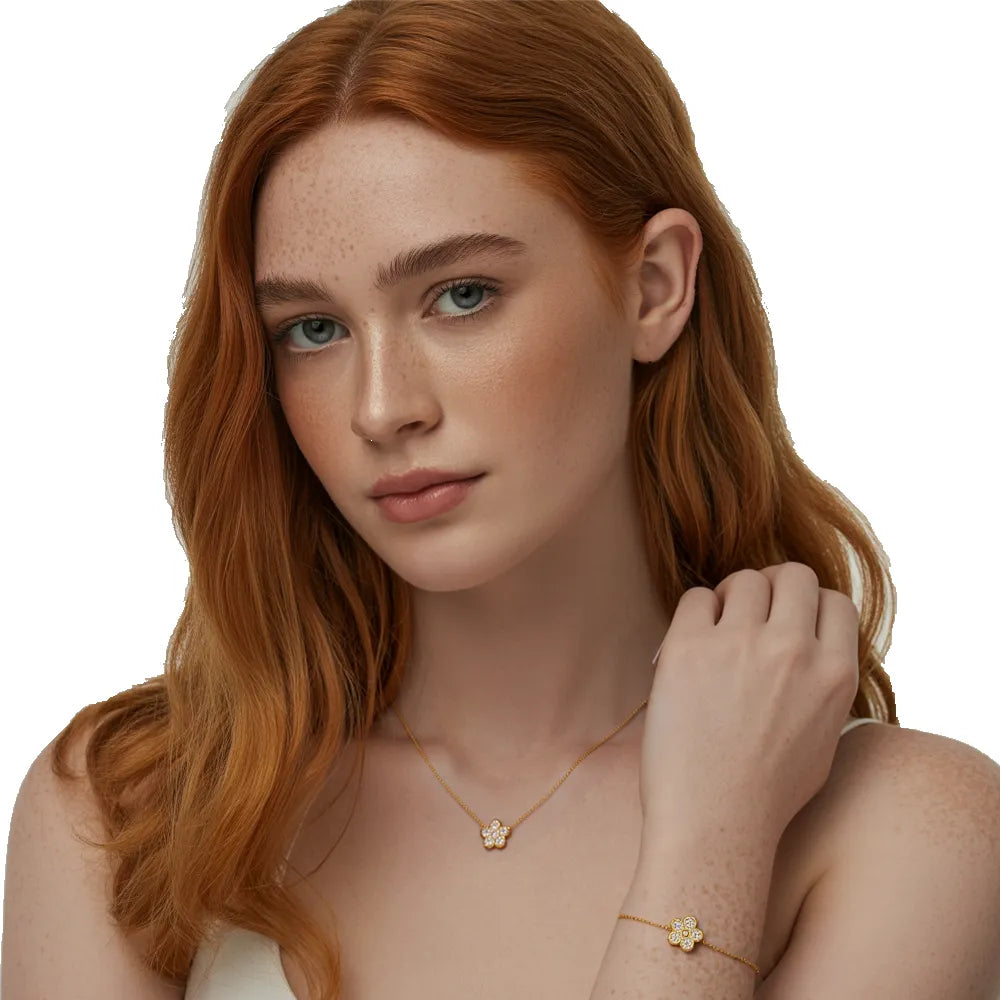 Model wearing the Flora Pavé Flower Necklace and Bracelet set in 18k gold.