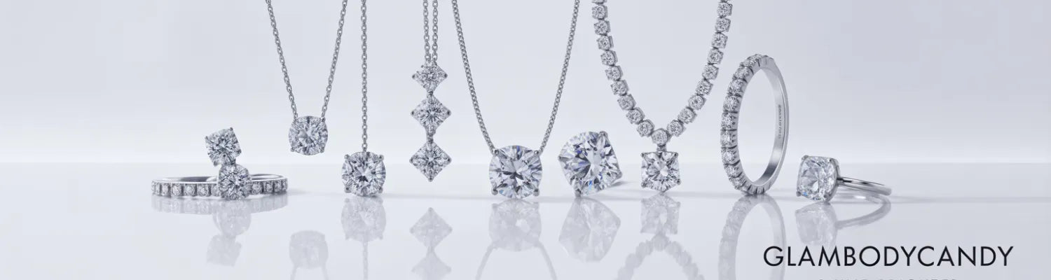 A beautiful flat lay of sparkling rings and necklaces from the Cubic Zirconia Jewelry Collection by GlamBodyCandy.