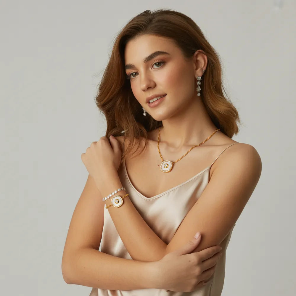 A model showcasing a matching gold set and a classic silver set from the GlamBodyCandy Jewelry Sets collection