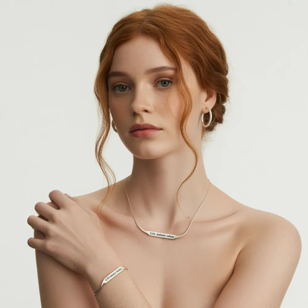 Model wearing a layered look with a tarnish-free stainless steel necklace and chain from the GlamBodyCandy jewelry collection