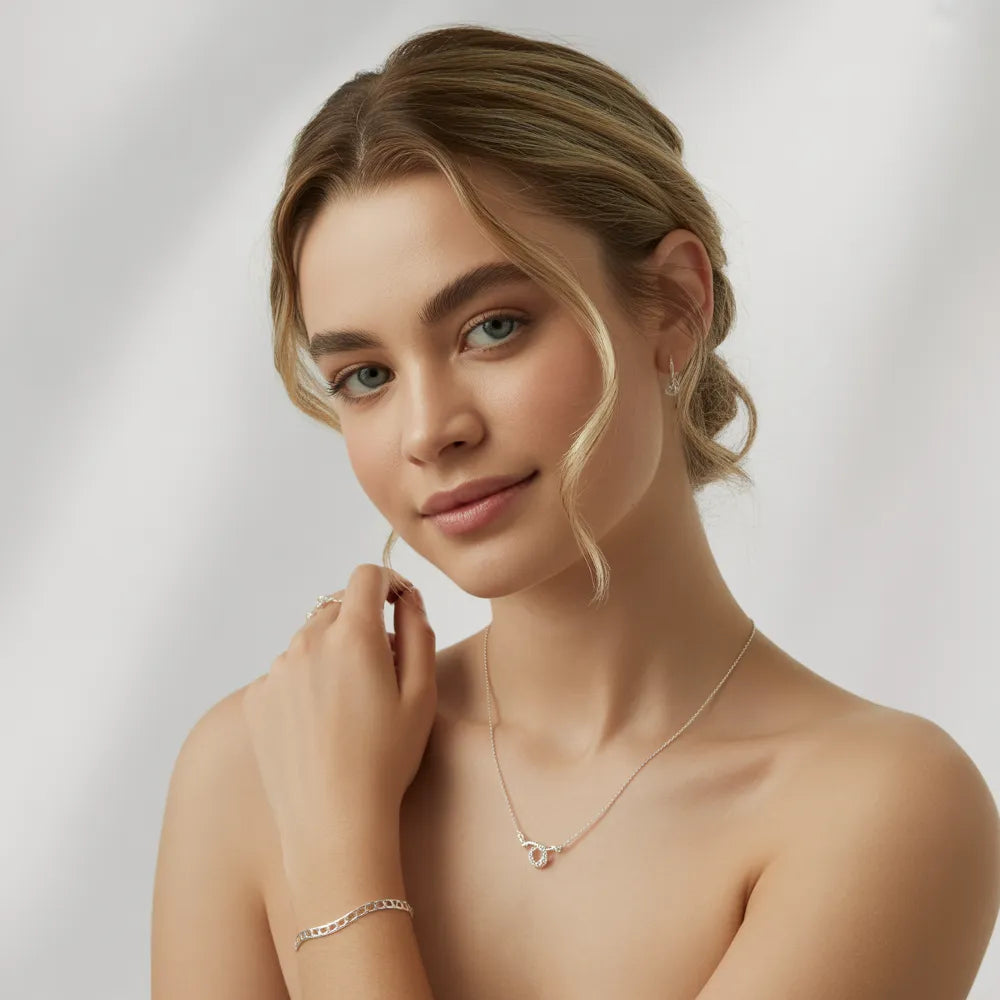 A collection of affordable bracelets for women, including chains, bangles, and tennis bracelets, all on sale