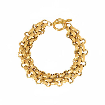 Studio shot of an 18K gold plated stainless steel bracelet with thick chunky links and a front toggle clasp, isolated on white.