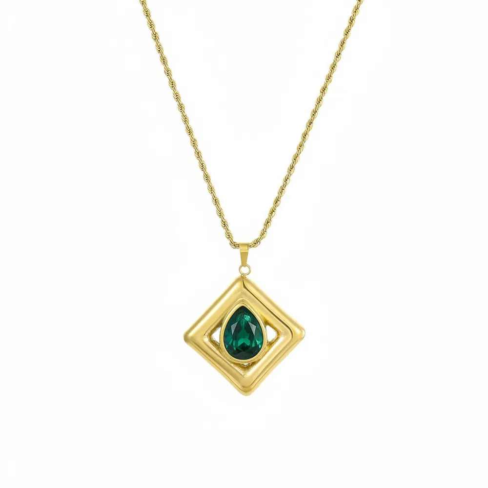 18K gold plated rope chain necklace featuring a square geometric pendant with a pear-cut emerald green zirconia center, isolated on white