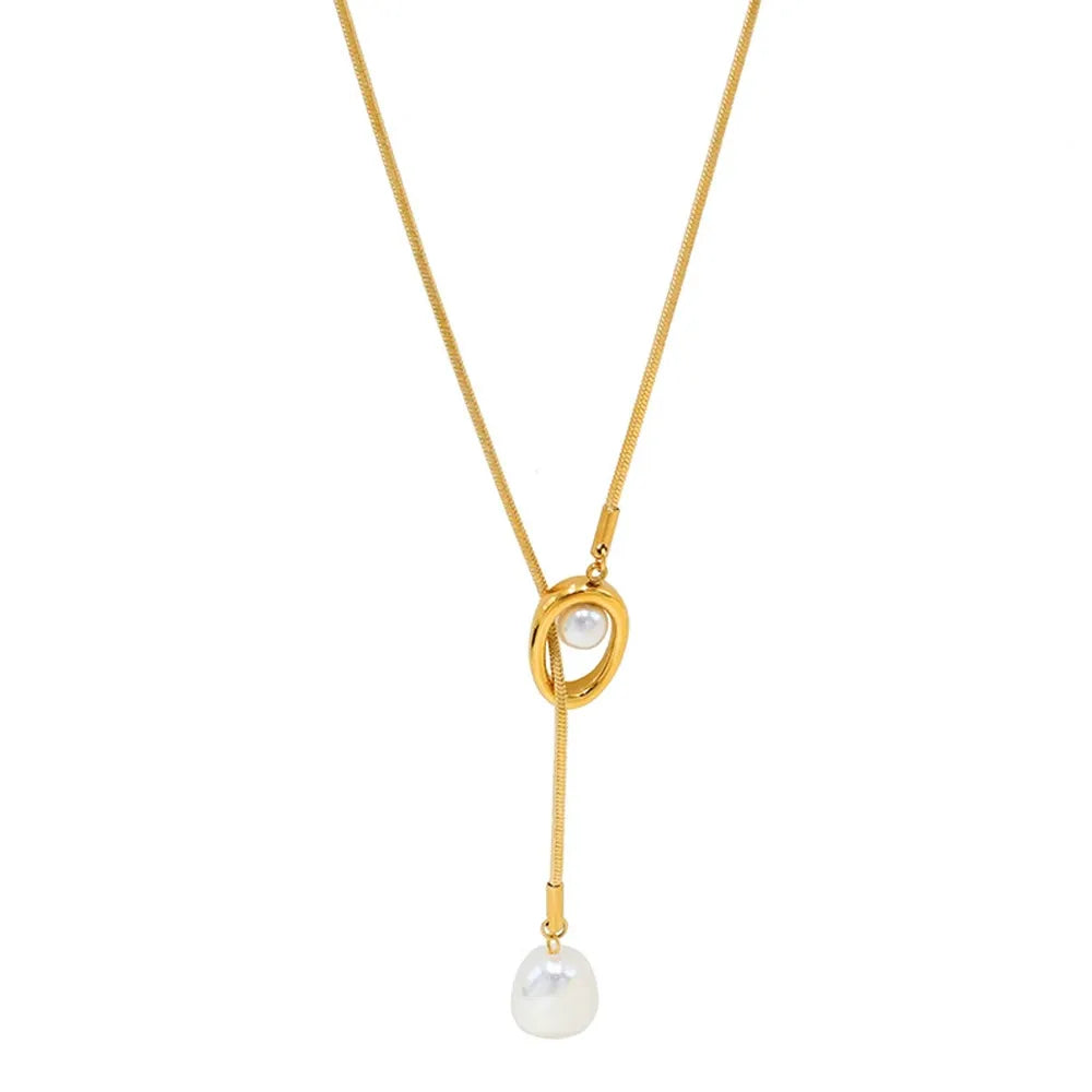 18K gold plated stainless steel lariat necklace featuring a smooth snake chain that slides through a loop, ending with a baroque pearl drop
