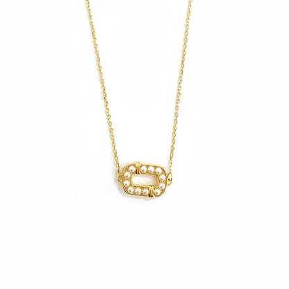 Front view of 18K gold plated S925 sterling silver necklace featuring an oval frame pendant lined with small pearls.