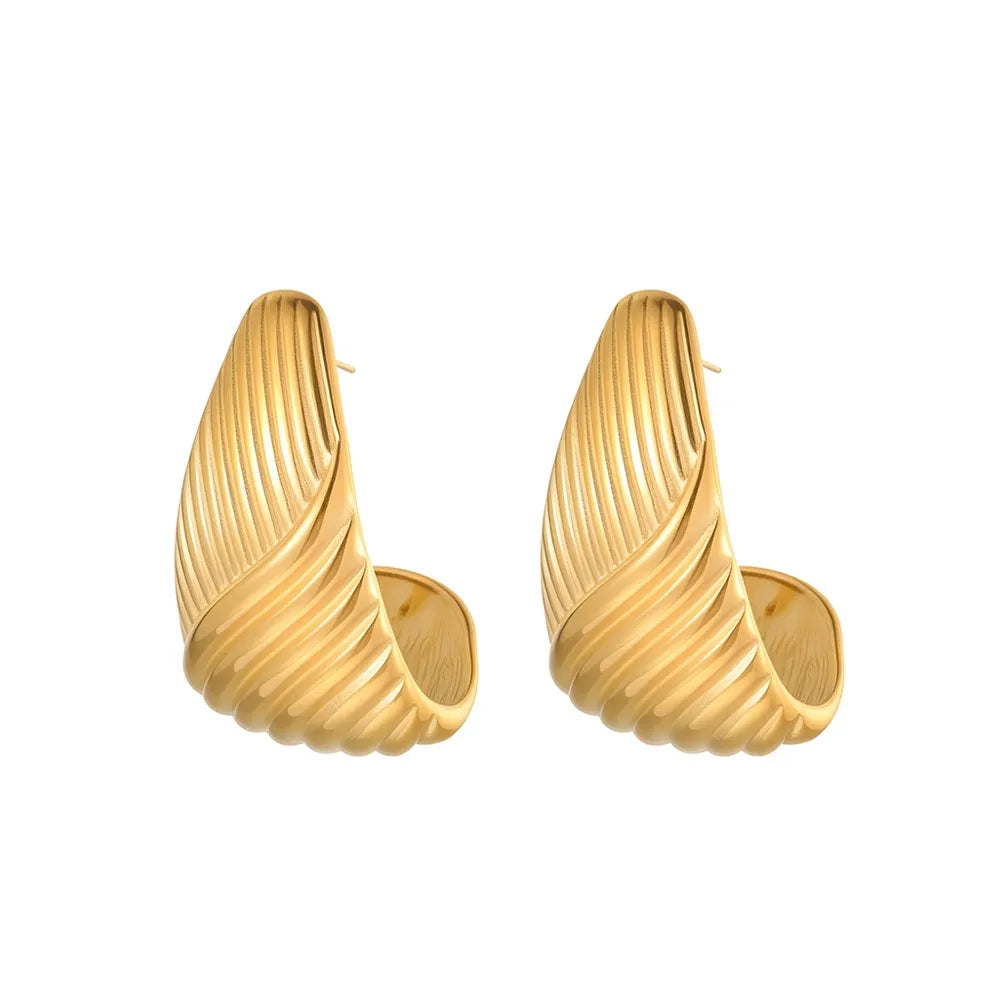 Front view of 18K gold plated stainless steel ribbed C-hoop earrings isolated on a white background, showing the textured details.
