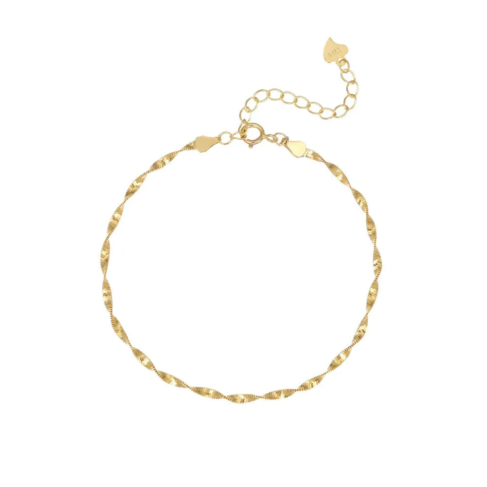 Studio shot of an 18K gold plated S925 sterling silver water wave chain bracelet, featuring a twisted shimmering design on a white background.