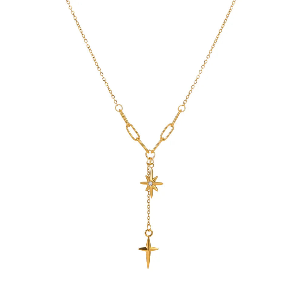 18K gold plated Y-necklace featuring an eight-pointed star and a sleek cross pendant on a chain link design, isolated on white