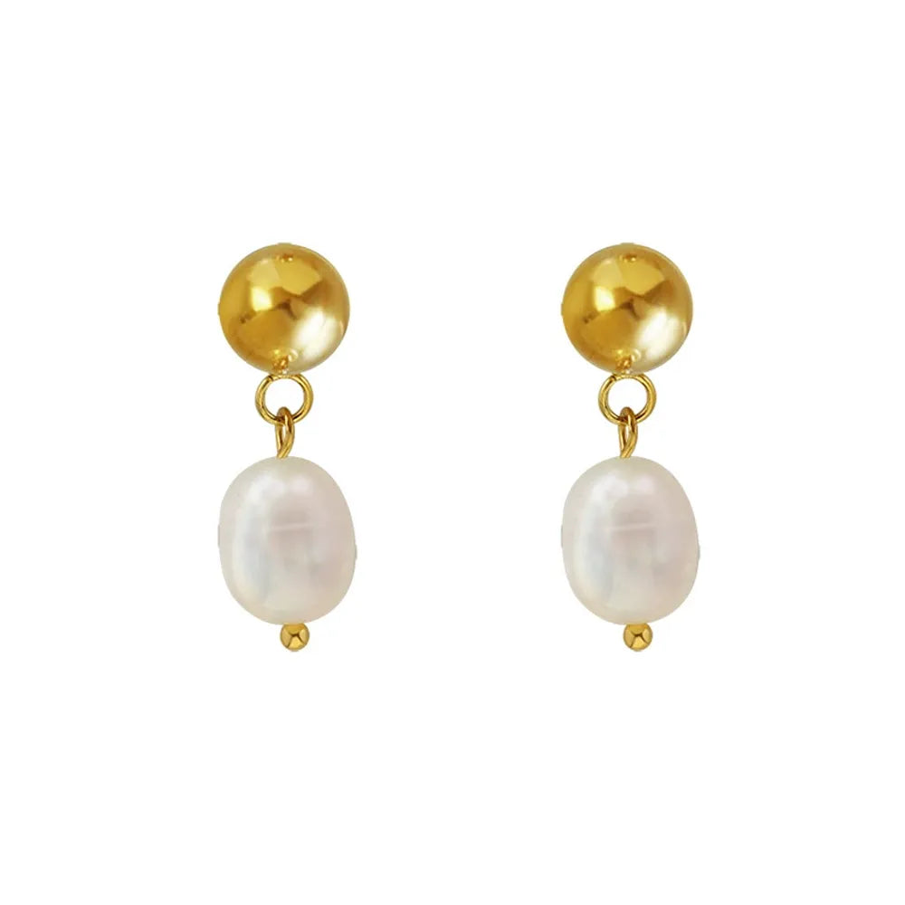 Studio shot of 18K gold plated earrings featuring a white pearl dangling from a gold ball stud, isolated on white