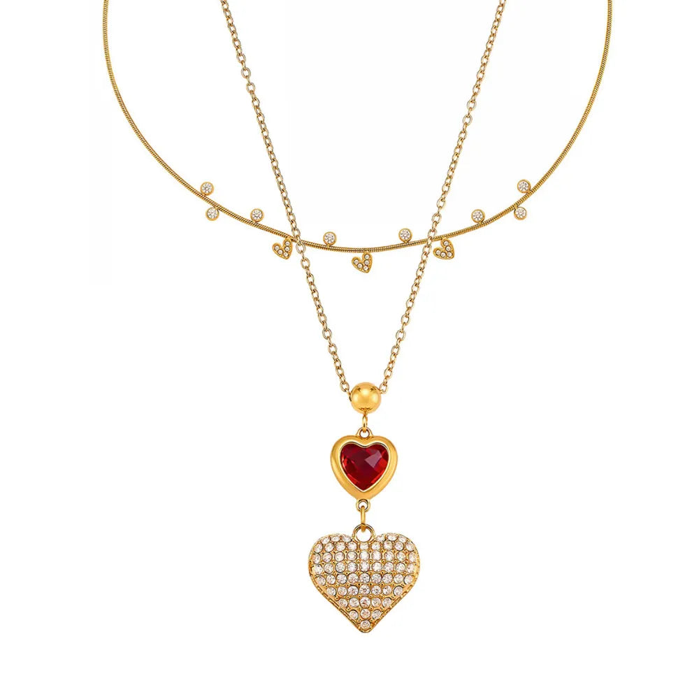 A 2-piece layered necklace set in gold, featuring a choker chain and a pendant chain with two hearts