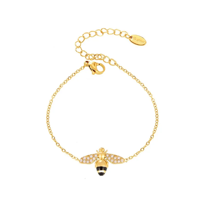 Apia Pavé Bee Charm Bracelet in 18k gold with zirconia and black enamel.