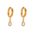 Pair of 18k gold hoop earrings with a dangling pavé-set zirconia teardrop charm.