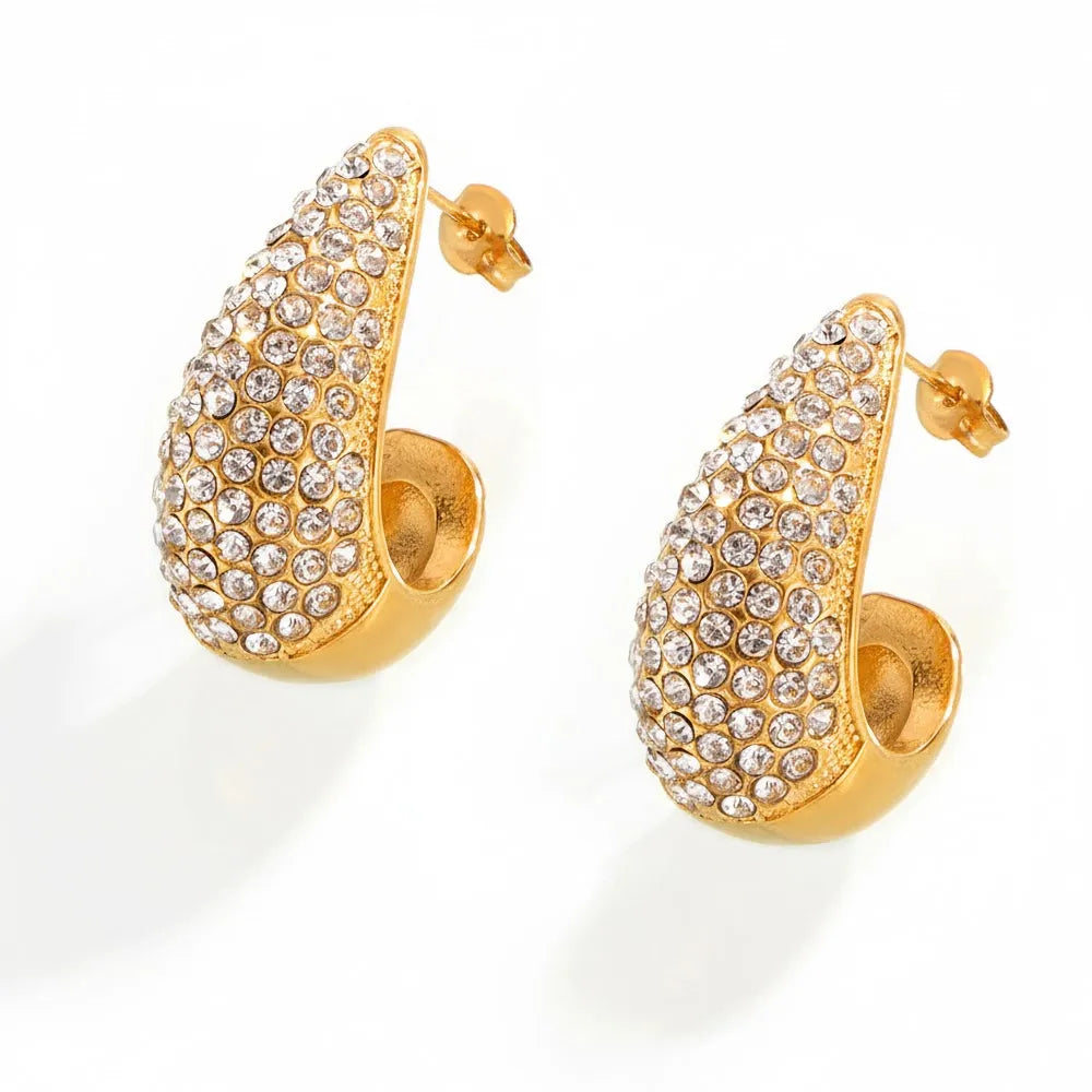 The Aura Teardrop Stud Earrings in 18k gold plate, featuring a full pavé zirconia setting, on a white background.