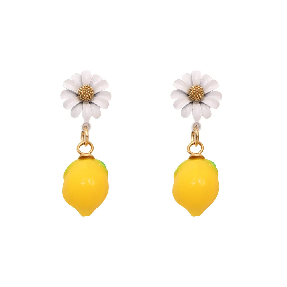 Whimsical stud earrings featuring a daisy flower and a dangling lemon, made of 316L stainless steel.