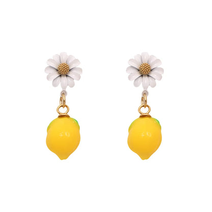 Whimsical stud earrings featuring a daisy flower and a dangling lemon, made of 316L stainless steel.