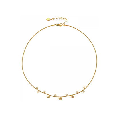A close-up of the elegant Eclat choker necklace in 18k gold plate.