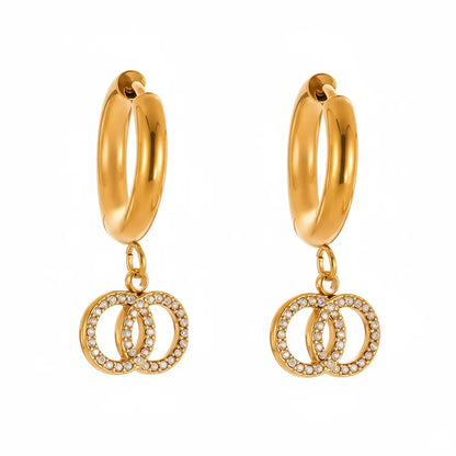 Elysia Interlocking Hoop Earrings in 18k gold with pavé zirconia rings.