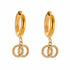 Elysia Interlocking Hoop Earrings in 18k gold with pavé zirconia rings.