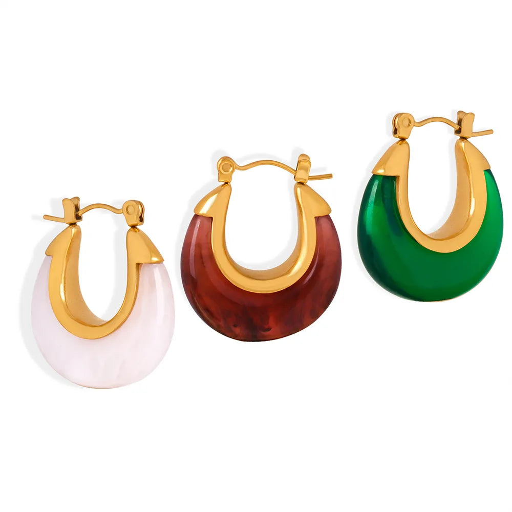 Collection of Esme Resin Hoop Earrings in White, Emerald Green, and Amber Tortoise, with 18k gold accents
