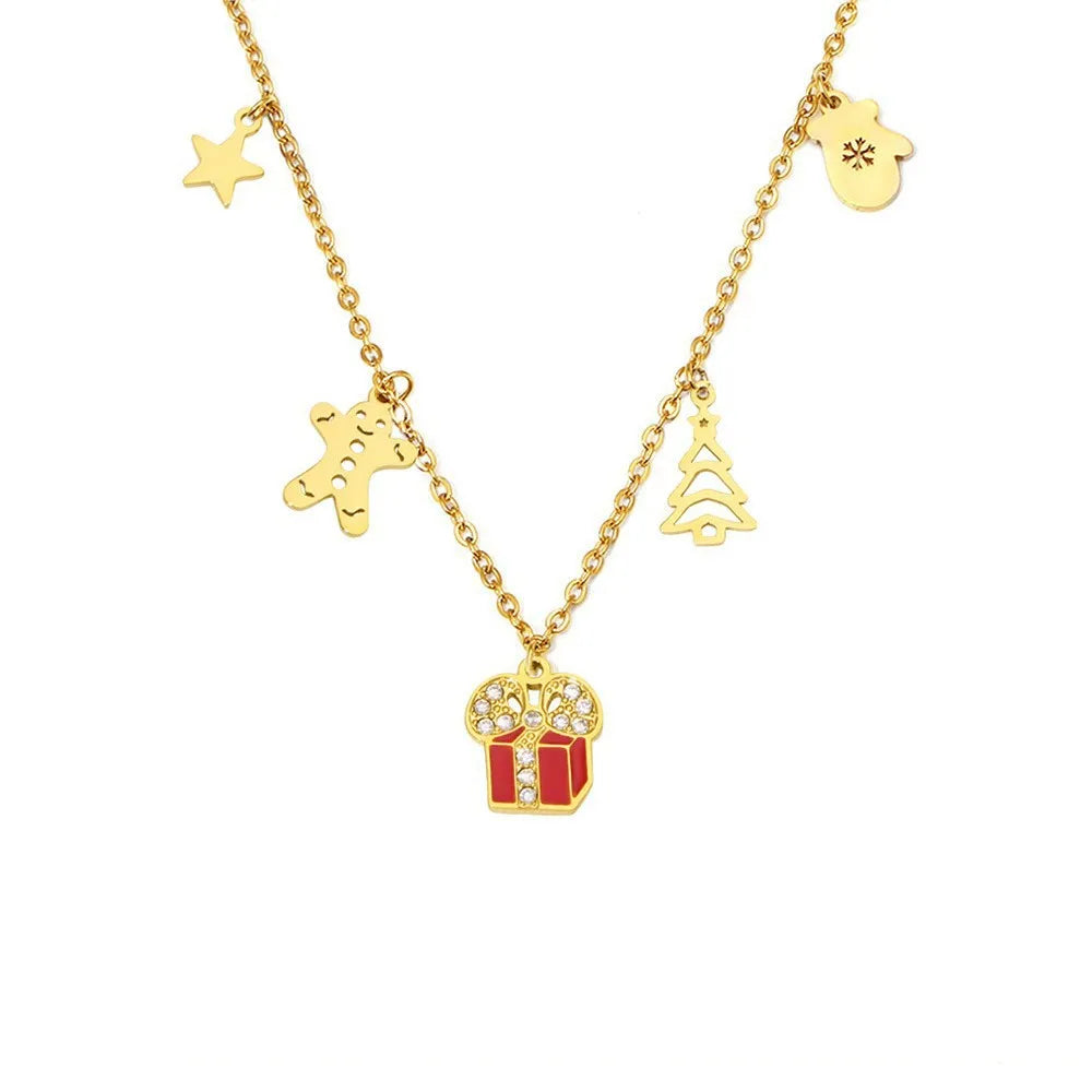 The Festive Enamel Charm Necklace with three holiday-themed pendants, shown on a clean white background