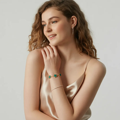 The Fleur Bloom Bracelet with a vibrant turquoise stone, shown on a model&