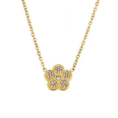 Flora Pavé Flower Necklace in 18k gold with AAAAA-Grade zirconia on white background.