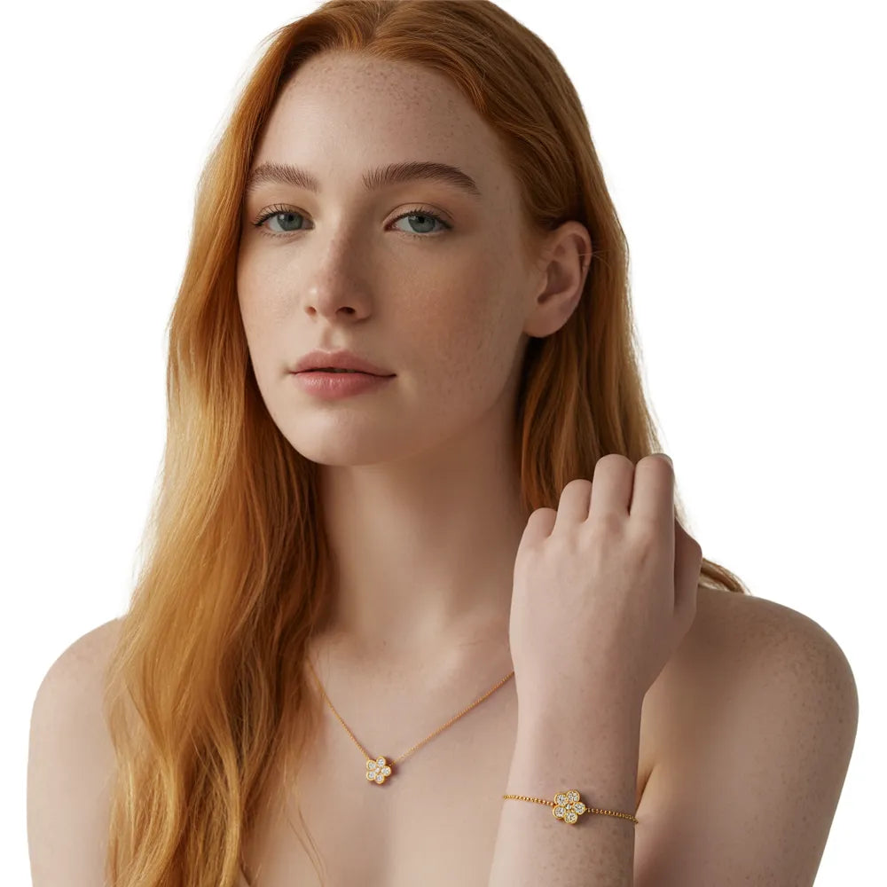 Model with red hair wearing the complete Flora Pavé Flower Jewelry Set