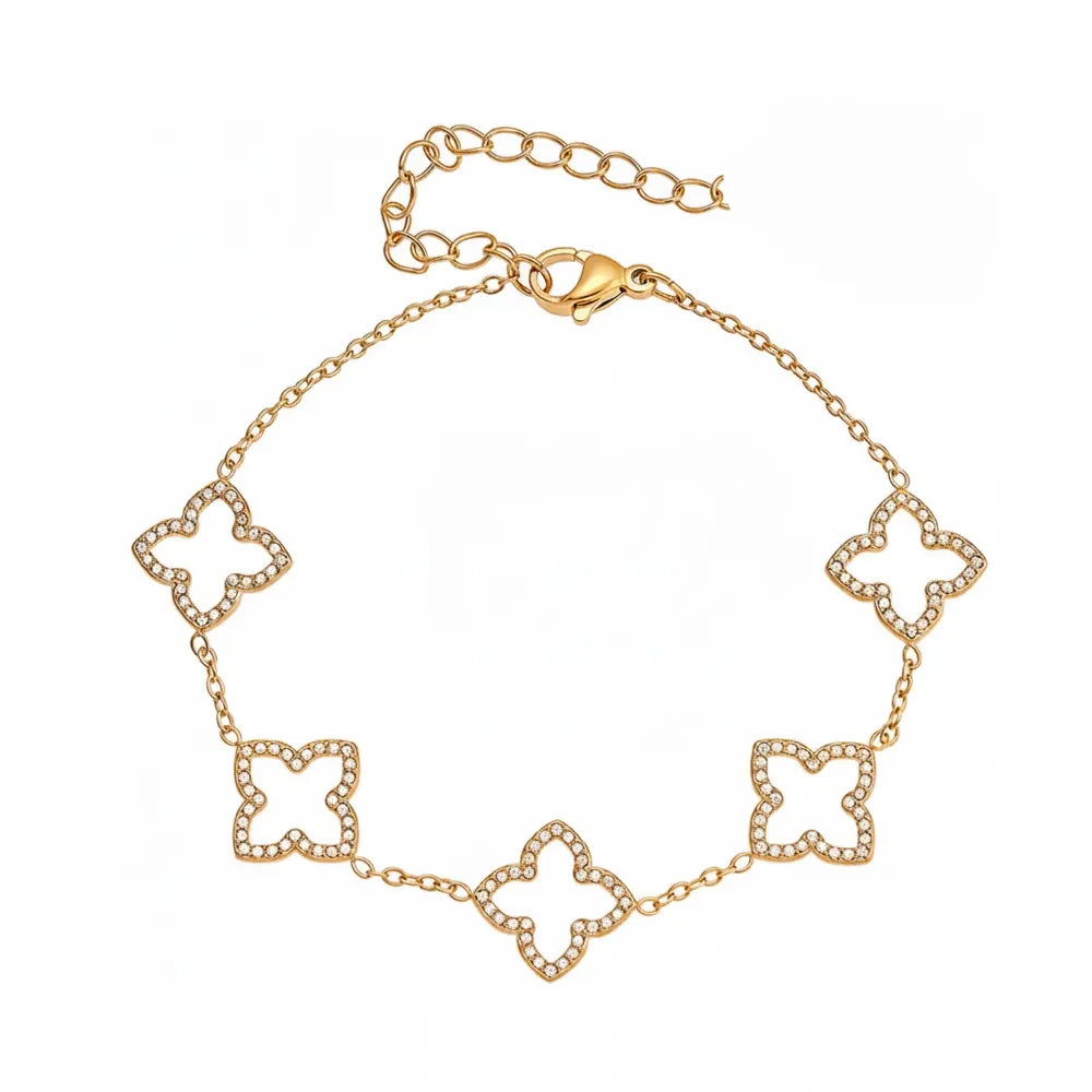 The Fortuna Clover Bracelet in 18k gold plate, featuring alternating pavé zirconia and polished clovers, on a white background