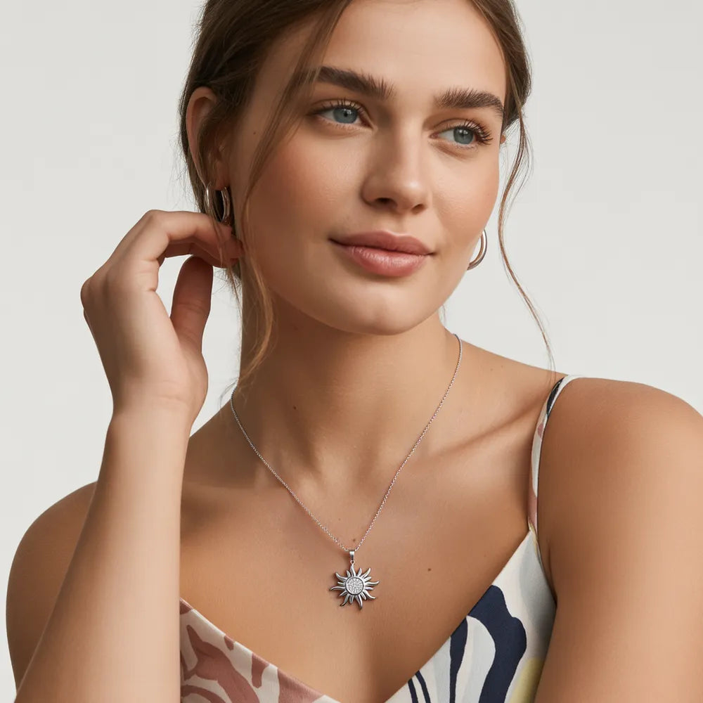 Model wearing the Glambodycandy You Are My Sunshine silver 316L stainless steel sunflower necklace, a trendy piece of friendship jewelry